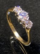 18ct Gold three stone Diamond ring central stone approx 0.25ct and ring size 'O'
