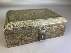 Indian Silver trinket box with all over foliate design handle and lock approx 18 x 12.5 x 7cm &