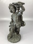 Bronze of a boy candle holder with hollow trunk spill vase behind approx 28cm tall
