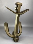 Brass desk ornament/paperweight in the form of an anchor marked 'Martin's patent. Self canting.