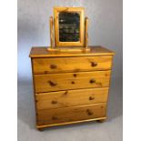 Pine chest of four drawers, approx 70cm x 34cm x 74cm tall along with a small pine vanity mirror