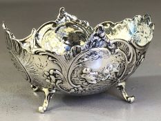 Silver Victorian Hallmarked repousse bowl on four scroll feet London by George Piercy approx 120g