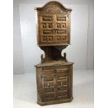 Heavily carved corner cupboard, approx 190cm in height