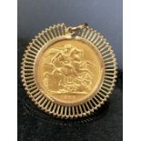 Gold Full Sovereign dated 1899 in a Gold 9ct Mount total weight approx 10.3g