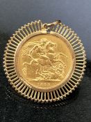 Gold Full Sovereign dated 1899 in a Gold 9ct Mount total weight approx 10.3g
