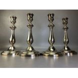 Four fine heavy matching Silver coloured candlesticks by French maker Christofle approx 23cm tall