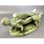 Large Clement Massier glazed pottery sculpture depicting four cherubs and a boat impressed marks