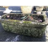 Stone garden trough / planter with lions head deign, approx 71cm x 27cm x 28cm tall