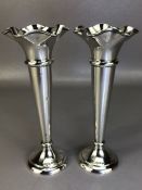 Silver Hallmarked Sheffield tall wavy edged vases by Walker and hall approx 20cm tall