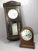 Two clocks to include a mantel clock and a wall clock