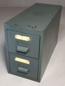 Small grey metal desktop filing cabinet of two drawers, approx 51cm x 21cm x 34cm