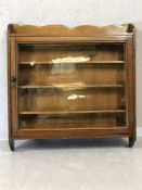 Small Antique wall-hanging display case with glazed door, four shelves and key, approx 56cm x 58cm