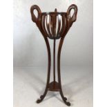 Swan-necked modern wooden plant stand, approx 130cm tall