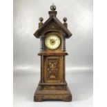 Steeple topped mantel clock with white and gilt face, approx 34cm in height