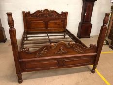 Carved wooden bed frame, approx 160cm wide (A/F)