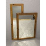 Two pine framed mirrors, the larger approx 73cm x 105cm