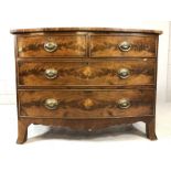 Bow-fronted chest of four drawers on splayed feet with original brass handles, approx 107cm x 48cm x