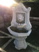 Two tier Garden water feature with lion's head design, approx height 128cm