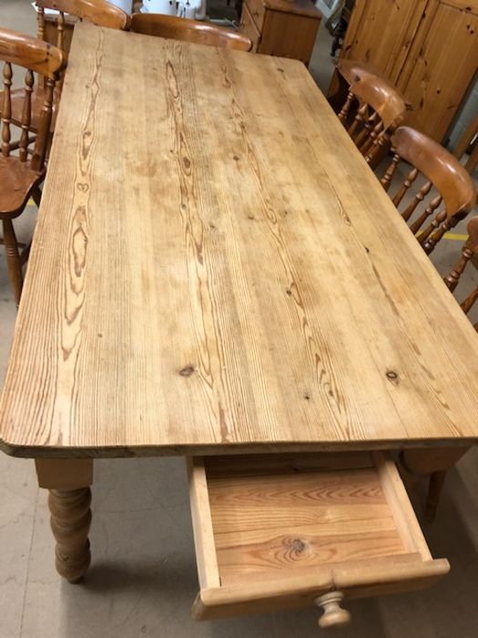 Pine farmhouse style dining table with drawer to one end and turned legs, approx 183cm x 90cm x 77cm - Image 6 of 6