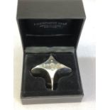 Hallmarked Silver champagne star/ cork for the year 2000 in presentation box approx 113g