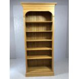 Tall pine bookcase with five shelves, approx 90cm x 32cm x 200cm tall