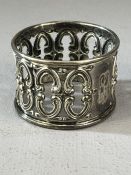 Marked Sterling 455 and with makers mark, a Silver ornate napkin ring