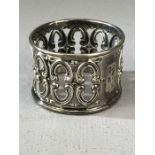 Marked Sterling 455 and with makers mark, a Silver ornate napkin ring