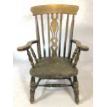 Large slat-back wooden armchair