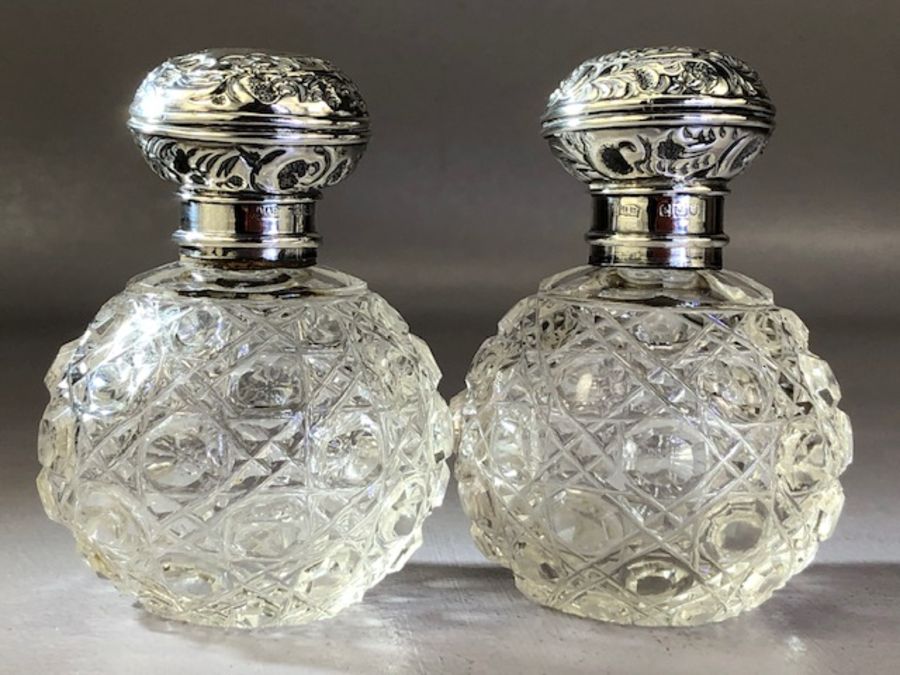 Pair of Silver topped Victorian scent bottles Hallmarked for London 1825 by maker J.B - Image 3 of 4