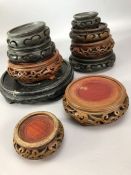 Collection of 10 wooden Chinese ginger jar bases, the largest approx 17cm in diameter
