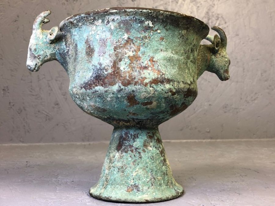 Ancient Luristan / Middle Eastern bronze vessel on pedestal base with rams heads, approx 16cm tall - Image 6 of 9