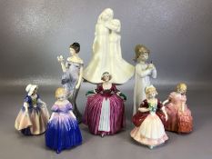 Collection of eight porcelain figurines to include a young girl playing a musical instrument by