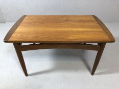 Mid Century G-Plan coffee table on tapering legs, approx 82cm x 50cm x 43cm tall