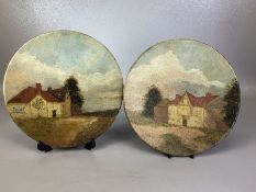 Pair of hand painted Folk Art metal circular plaques with countryside images both signed J.T. Sharpe