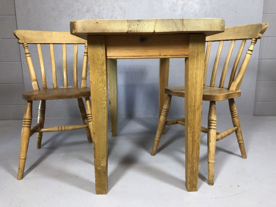 Small pine table and two pine chairs, table approx 1060x 62 x 8o cm tall - Image 2 of 4