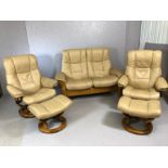 stressless Leather three piece suite. two seater reclining sofa and two armchairs with two