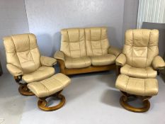 stressless Leather three piece suite. two seater reclining sofa and two armchairs with two