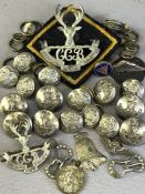 Collection of military buttons, cap badges etc