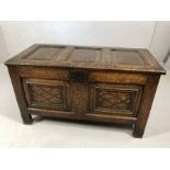 Eighteenth century panelled oak coffer, original hinges and lock, inlay to front panels and