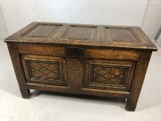 Eighteenth century panelled oak coffer, original hinges and lock, inlay to front panels and
