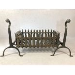 Cast iron fire basket and fire dogs, fire basket approx 74cm x 44cm x 25cm tall