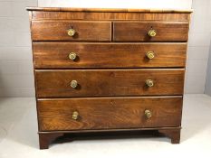 Chest of five drawers with ornate floral handles, approx 125cm x 53cm x 114cm tall