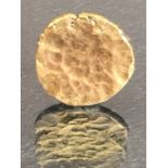 Gold Hammered coin (metal detector find) approx 2.2g and 12mm across possibly a gold Stater