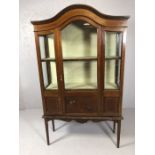 Edwardian inlaid display cabinet with two shelves and cupboard below, approx 101cm x 31cm x 178cm