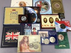 Collection of Uncirculated Proof coin sets to include Concorde $5, Millennium five pound coin,