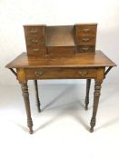 Writing desk on turned legs with gallery contains six drawers etc