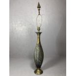 Large Middle Eastern brass lamp base with ornate detailing, approx 136cm in height to top of pointed