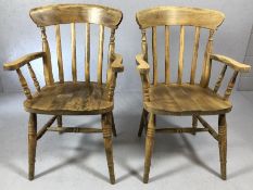 Pair of pine slat back elbow chairs on turned legs