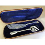 Victorian Solid Silver leather cased fish serving set of knife (approx 179g) and fork (approx 99g)