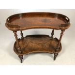 Kidney shaped walnut drinks trolley on turned legs and supports and original castors approx 77cm